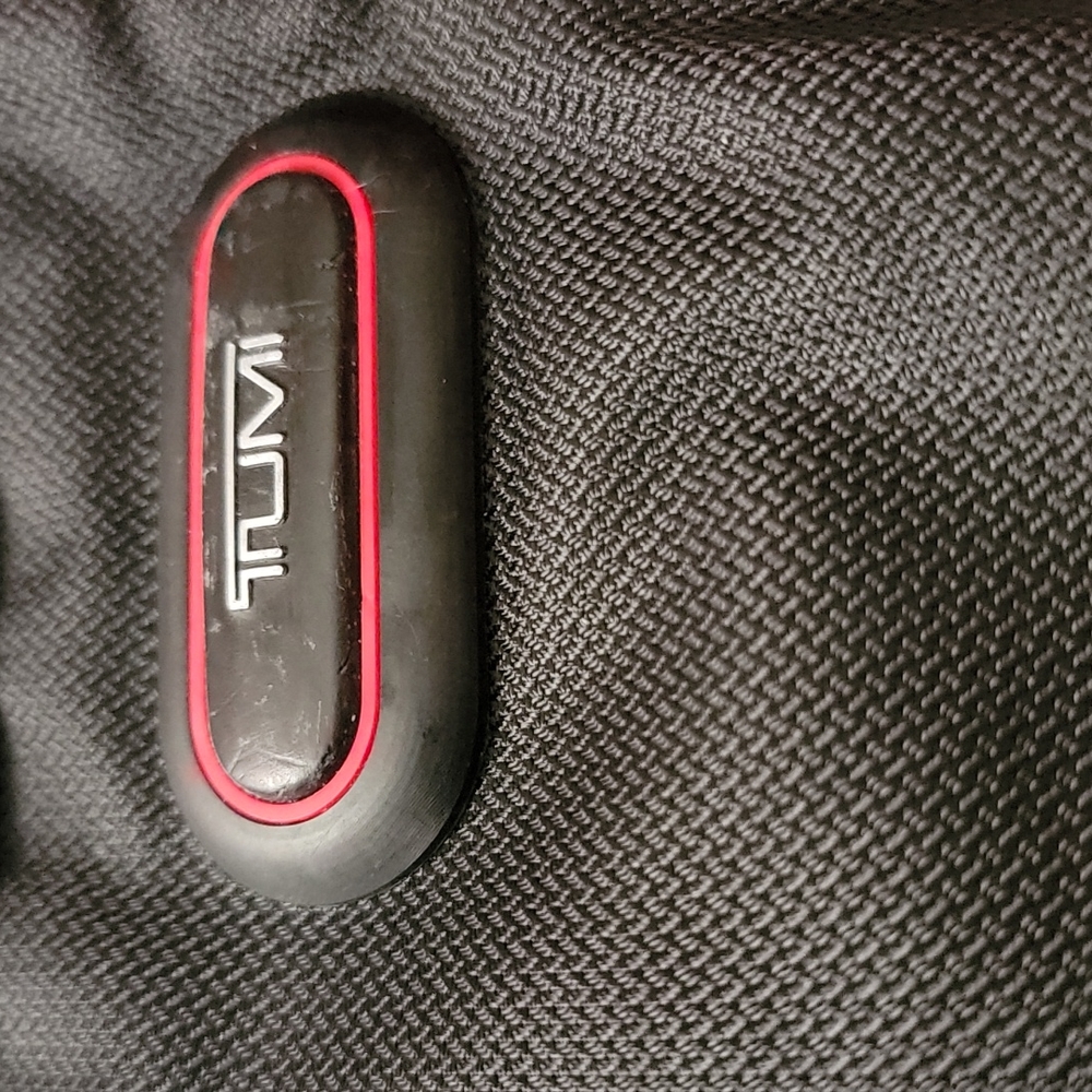 Tumi crossbody ( laptop bag)